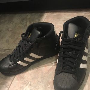 Adidas high top black shell sneakers size 7